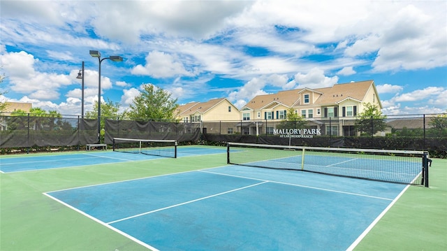 3431 Chestertown Loop, Bradenton, FL 34211 - view of tennis court featuring community basketball court and a residential view