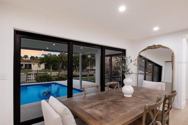 510 Putter Ln, Longboat Key, FL 34228 - dining space featuring recessed lighting and wood finished floors