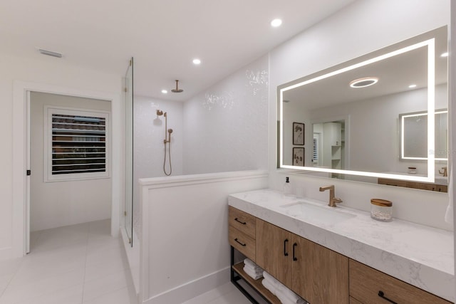 510 Putter Ln, Longboat Key, FL 34228 - bathroom featuring vanity, walk in shower, recessed lighting, and tile patterned flooring