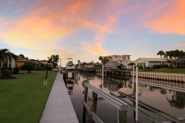 510 Putter Ln, Longboat Key, FL 34228 - dock featuring a water view, a yard, and boat lift