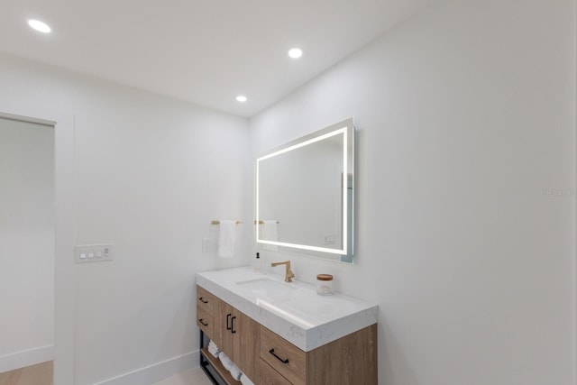 510 Putter Ln, Longboat Key, FL 34228 - bathroom featuring vanity and recessed lighting