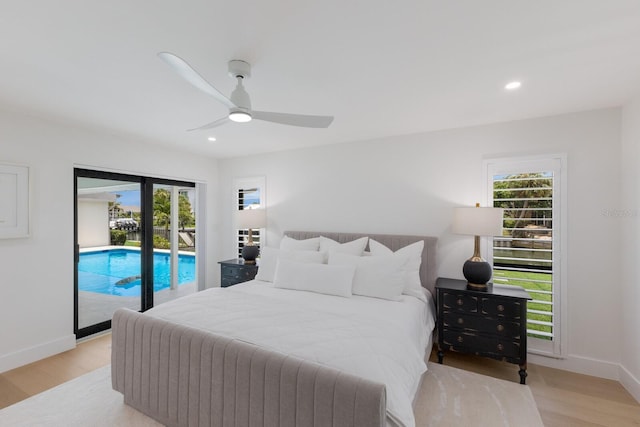 510 Putter Ln, Longboat Key, FL 34228 - bedroom with access to outside, wood finished floors, recessed lighting, and a ceiling fan