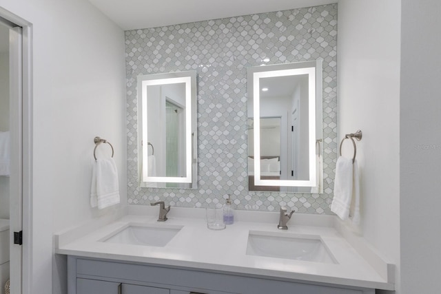 510 Putter Ln, Longboat Key, FL 34228 - full bath featuring double vanity and backsplash