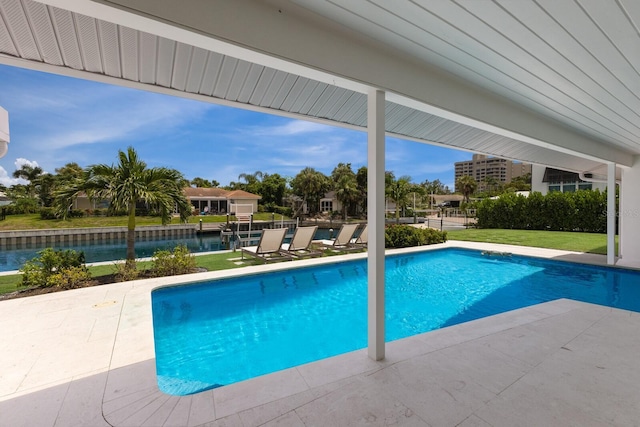 510 Putter Ln, Longboat Key, FL 34228 - outdoor pool with a patio and a water view