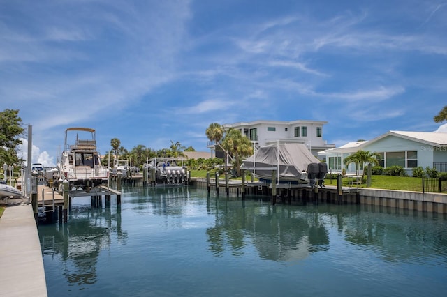 510 Putter Ln, Longboat Key, FL 34228 - dock with boat lift and a water view