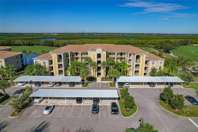 7121 River Hammock Dr Unit 102, Bradenton, FL 34212 - drone / aerial view of a nearby body of water and a golf club