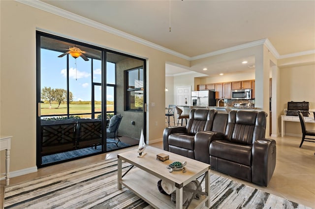 7121 River Hammock Dr Unit 102, Bradenton, FL 34212 - living area featuring ornamental molding, a ceiling fan, recessed lighting, and light tile patterned flooring