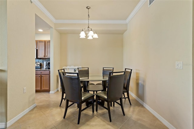 7121 River Hammock Dr Unit 102, Bradenton, FL 34212 - dining room with ornamental molding, a chandelier, and light tile patterned flooring