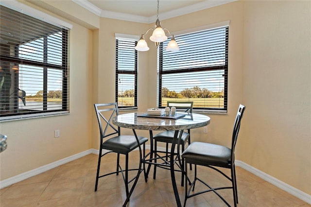 7121 River Hammock Dr Unit 102, Bradenton, FL 34212 - dining area with a chandelier, healthy amount of natural light, crown molding, and light tile patterned floors