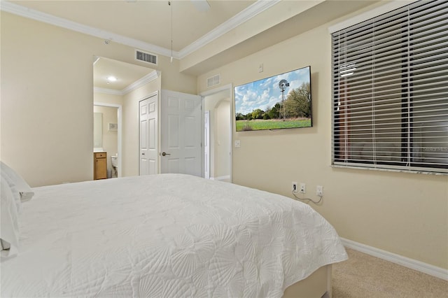 7121 River Hammock Dr Unit 102, Bradenton, FL 34212 - bedroom with ornamental molding, carpet, ensuite bathroom, and a closet
