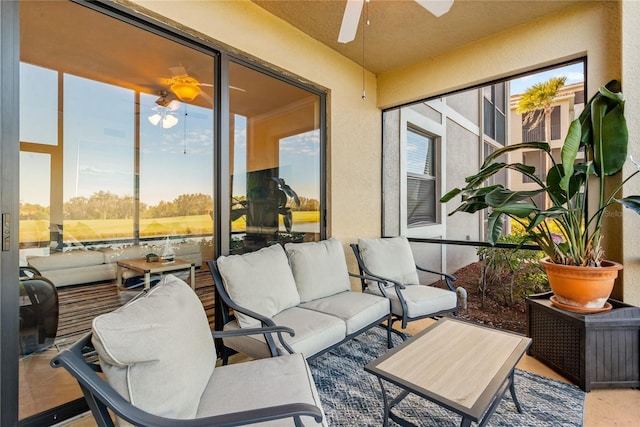 7121 River Hammock Dr Unit 102, Bradenton, FL 34212 - sunroom / solarium featuring ceiling fan and an outdoor living space