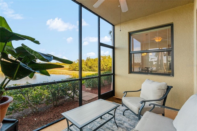 7121 River Hammock Dr Unit 102, Bradenton, FL 34212 - sunroom / solarium featuring ceiling fan, healthy amount of natural light, and vaulted ceiling