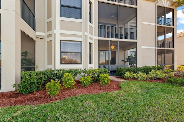 7121 River Hammock Dr Unit 102, Bradenton, FL 34212 - entrance to property featuring stucco siding and a lawn