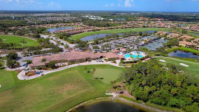 7121 River Hammock Dr Unit 102, Bradenton, FL 34212 - aerial view of property and surrounding area featuring nearby suburban area and a nearby body of water
