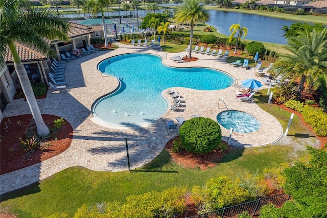 7121 River Hammock Dr Unit 102, Bradenton, FL 34212 - community pool with a water view and a patio