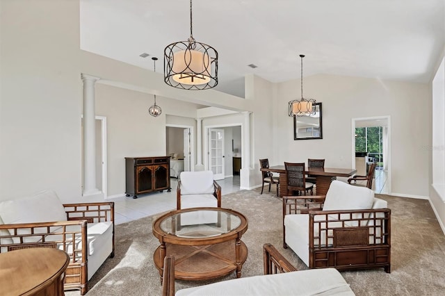 7960 Hampton Ct, University Park, FL 34201 - living area with ornate columns, lofted ceiling, and a chandelier