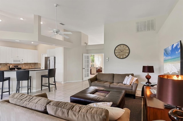 7960 Hampton Ct, University Park, FL 34201 - living area with high vaulted ceiling, ceiling fan, light tile patterned floors, and recessed lighting