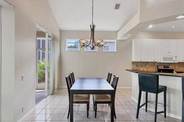7960 Hampton Ct, University Park, FL 34201 - dining space with a chandelier, recessed lighting, and light tile patterned flooring
