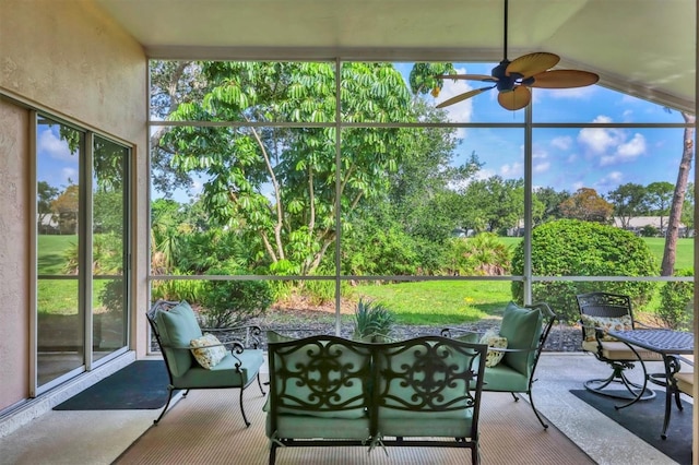 7960 Hampton Ct, University Park, FL 34201 - sunroom featuring ceiling fan, an outdoor living space, and plenty of natural light