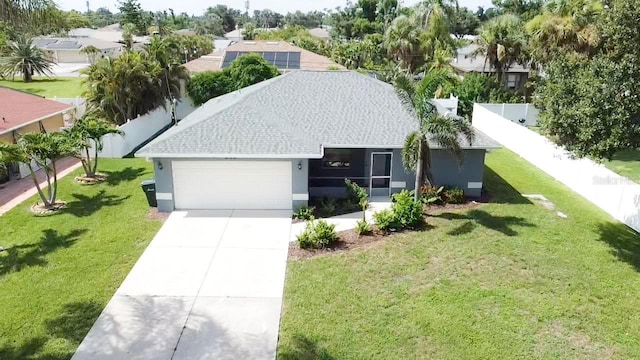 671 E Baffin Dr, Venice, FL 34293 - view of front of property with an attached garage, a shingled roof, concrete driveway, stucco siding, and a residential view
