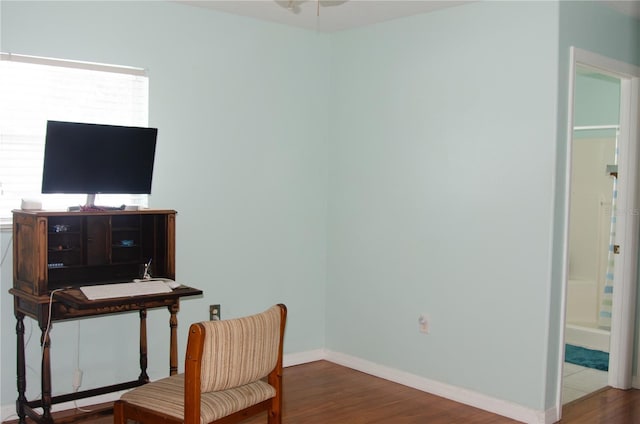 671 E Baffin Dr, Venice, FL 34293 - office space with wood finished floors and a ceiling fan