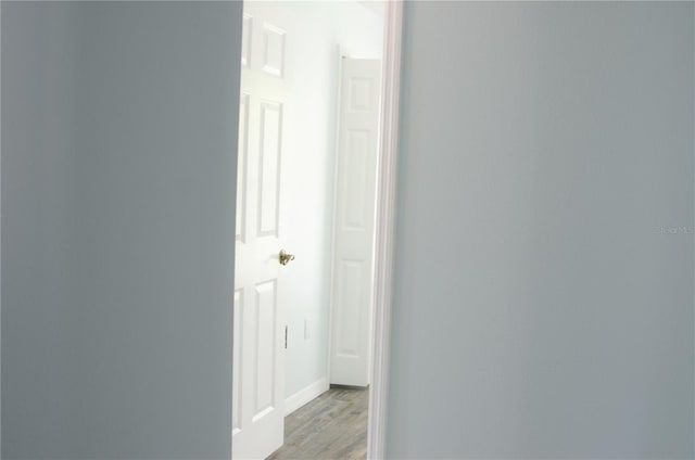 671 E Baffin Dr, Venice, FL 34293 - corridor featuring light wood finished floors and baseboards