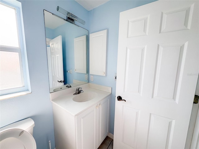 671 E Baffin Dr, Venice, FL 34293 - half bath with vanity and toilet