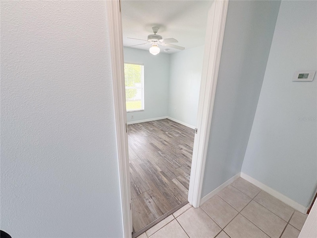 671 E Baffin Dr, Venice, FL 34293 - unfurnished room with a ceiling fan and light tile patterned floors
