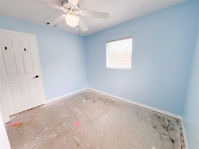 671 E Baffin Dr, Venice, FL 34293 - unfurnished bedroom featuring concrete flooring and a ceiling fan