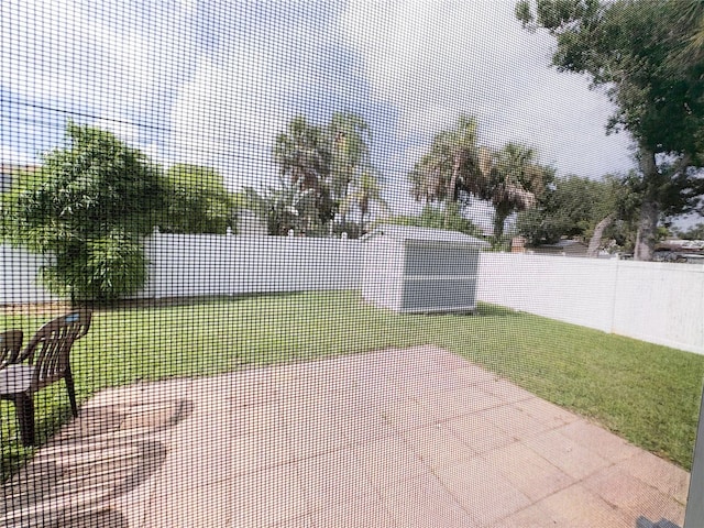 671 E Baffin Dr, Venice, FL 34293 - fenced backyard featuring a tennis court