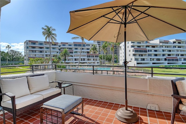 1485 Gulf Of Mexico Dr Unit 101, Longboat Key, FL 34228 - patio / terrace with an outdoor living space