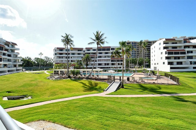 1485 Gulf Of Mexico Dr Unit 101, Longboat Key, FL 34228 - surrounding community featuring a swimming pool and a lawn