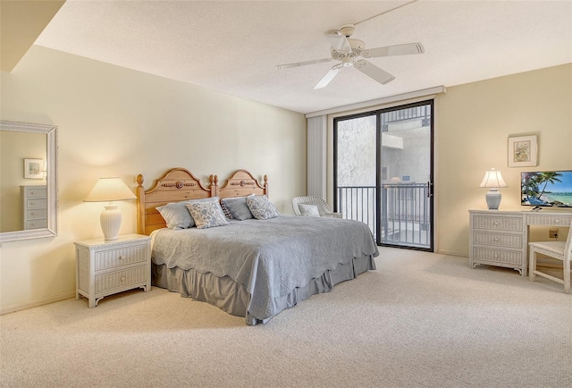 1485 Gulf Of Mexico Dr Unit 101, Longboat Key, FL 34228 - bedroom featuring access to exterior, carpet floors, and ceiling fan