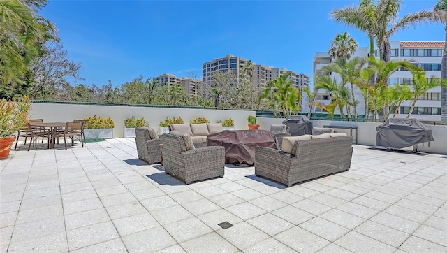 1485 Gulf Of Mexico Dr Unit 101, Longboat Key, FL 34228 - view of patio with an outdoor hangout area and a grill