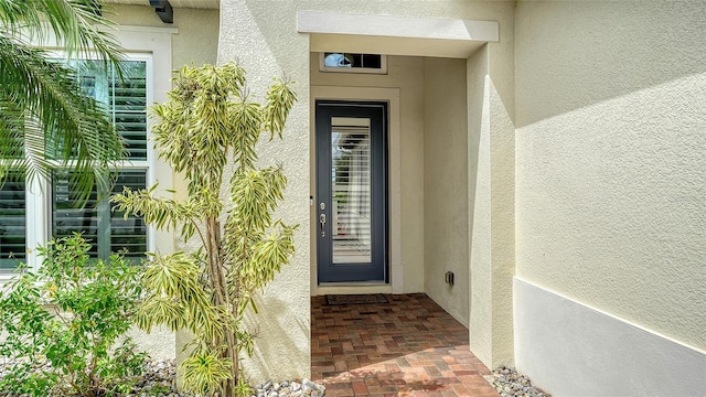 1114 Bearing Ct, Bradenton, FL 34208 - doorway to property with stucco siding