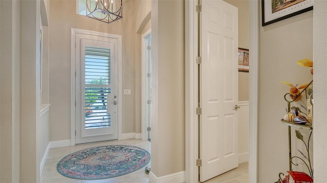 1114 Bearing Ct, Bradenton, FL 34208 - entryway featuring a chandelier and arched walkways