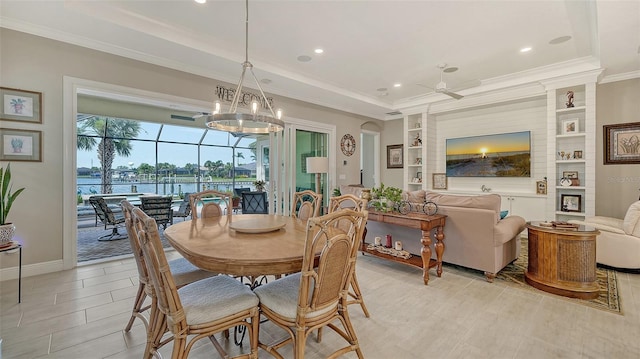 1114 Bearing Ct, Bradenton, FL 34208 - dining room with ornamental molding, a raised ceiling, recessed lighting, built in features, and ceiling fan