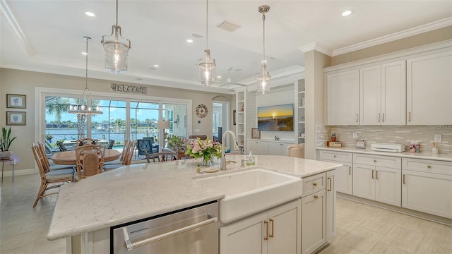 1114 Bearing Ct, Bradenton, FL 34208 - kitchen with dishwasher, recessed lighting, backsplash, white cabinets, and crown molding