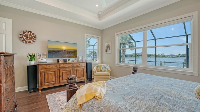 1114 Bearing Ct, Bradenton, FL 34208 - bedroom featuring dark wood finished floors, ornamental molding, a tray ceiling, and recessed lighting