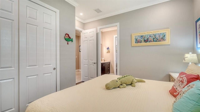 1114 Bearing Ct, Bradenton, FL 34208 - bedroom with crown molding, recessed lighting, connected bathroom, and a closet