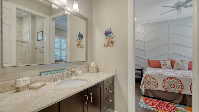 1114 Bearing Ct, Bradenton, FL 34208 - bathroom featuring vanity, a ceiling fan, and crown molding