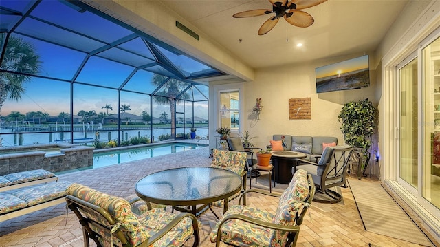 1114 Bearing Ct, Bradenton, FL 34208 - view of patio featuring an outdoor living space, a lanai, a ceiling fan, and a pool with connected hot tub