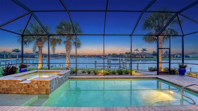 1114 Bearing Ct, Bradenton, FL 34208 - outdoor pool with an in-ground hot tub, a lanai, a water view, and a patio