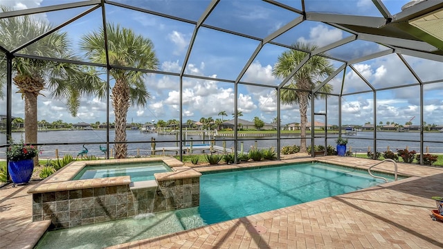 1114 Bearing Ct, Bradenton, FL 34208 - view of swimming pool featuring a water view, a lanai, a patio, and a pool with connected hot tub
