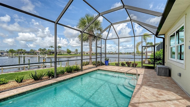 1114 Bearing Ct, Bradenton, FL 34208 - outdoor pool with a water view, a patio, and a lanai