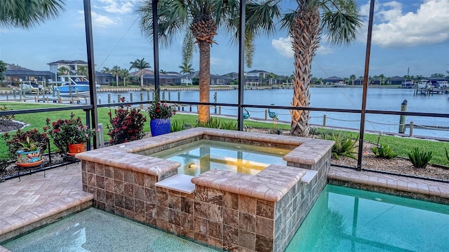 1114 Bearing Ct, Bradenton, FL 34208 - view of pool with an in-ground hot tub, a water view, and a residential view