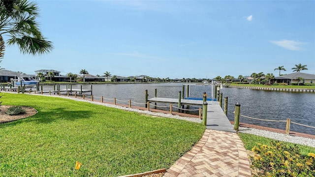 1114 Bearing Ct, Bradenton, FL 34208 - dock with boat lift, a yard, a water view, and a residential view
