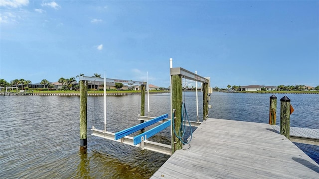 1114 Bearing Ct, Bradenton, FL 34208 - dock featuring boat lift and a water view