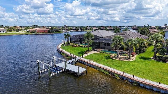 1114 Bearing Ct, Bradenton, FL 34208 - dock area with a water view, boat lift, an outdoor pool, and a lawn