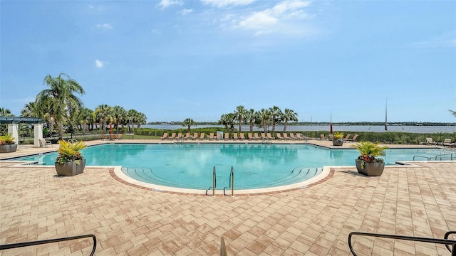 1114 Bearing Ct, Bradenton, FL 34208 - community pool featuring a patio